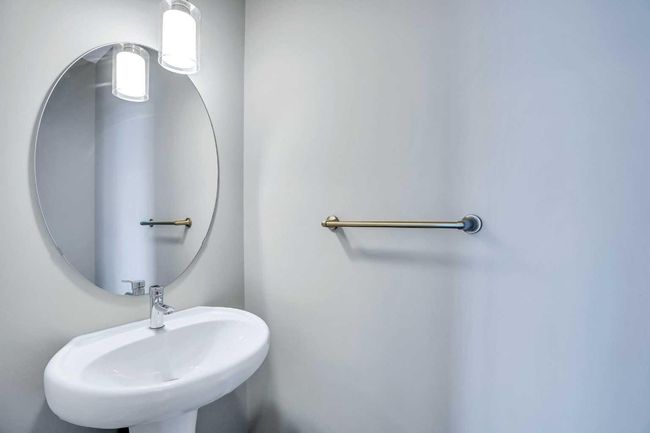 201 - 70 Saddlestone Dr Ne, Townhouse with 2 bedrooms, 3 bathrooms and 1 parking in Calgary AB | Image 12