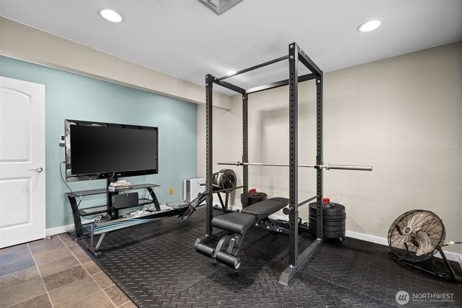 Lower level 3rd bedroom with heated floors | Image 26