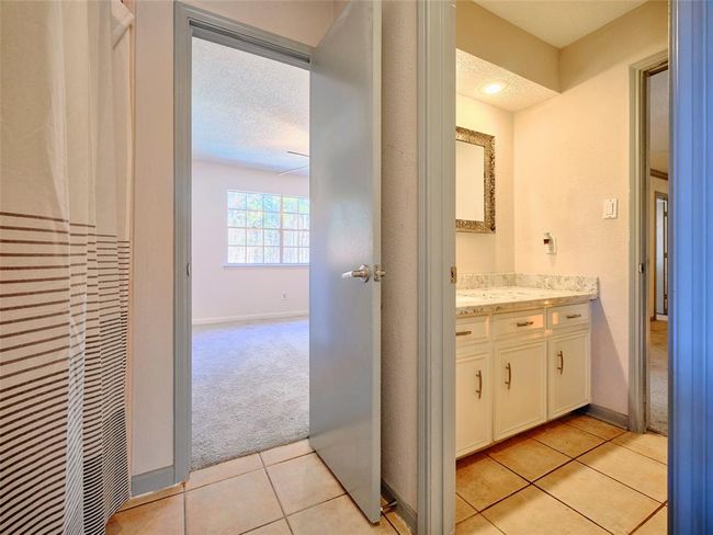 Conveniently connecting two of the bedrooms. | Image 27