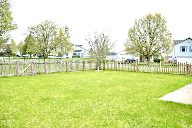view of yard featuring a residential view and a fenced backyard | Image 45
