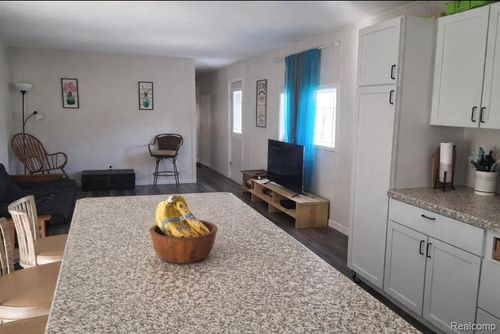 1674 Sunburst St, Grawn, MI, 49637-9702 | Card Image