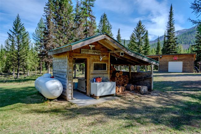 View of outbuilding featuring an outdoor structure and a mountain view | Image 71