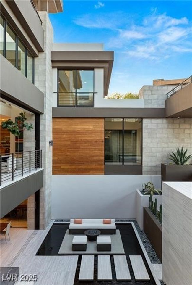 View of side of property featuring a fire pit | Image 32