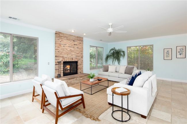 Chisel edged Travertine flooring throughout the family room and kitchen | Image 23
