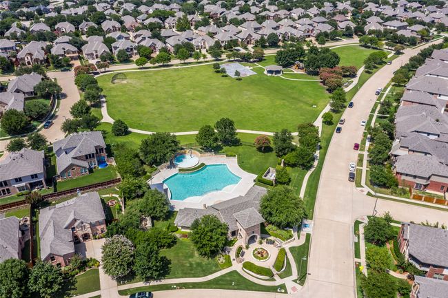Aerial view of residential area with a pool | Image 37