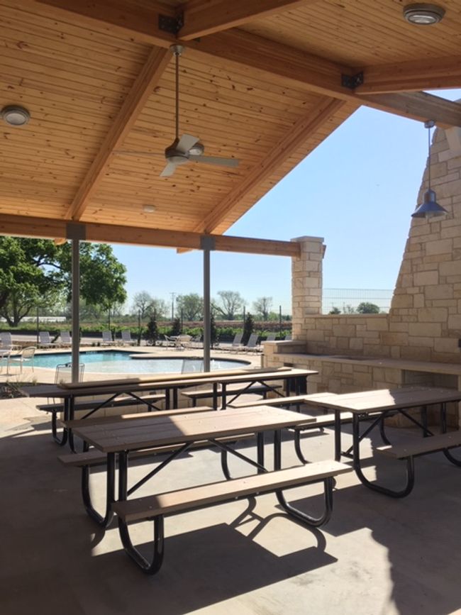 View of patio featuring a community pool | Image 32