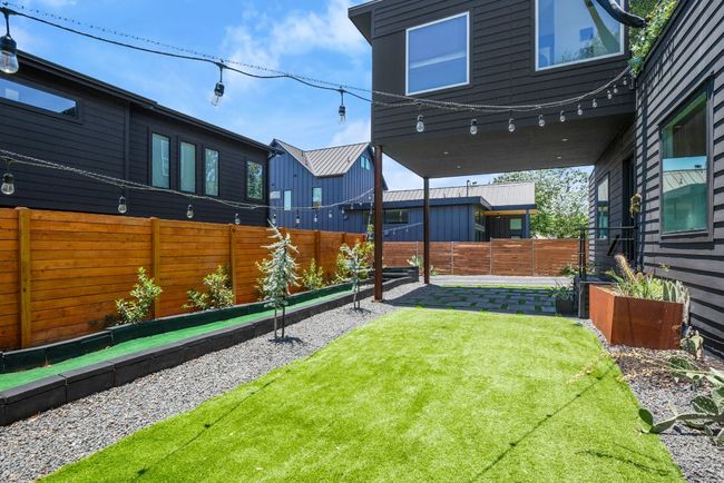 View of fenced backyard | Image 31
