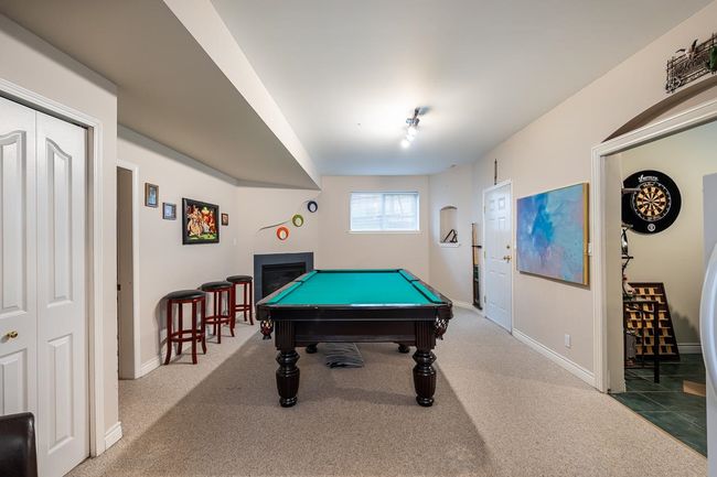 Recreation room featuring baseboards, billiards, and carpet flooring | Image 31