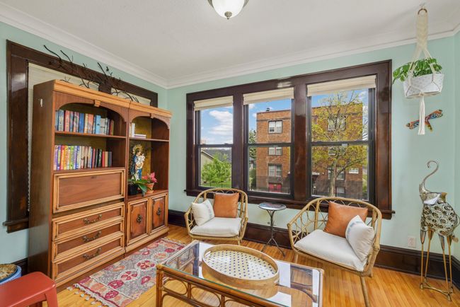 The sunroom is an incredible space that is filled with natural sunlight from three directions. | Image 9