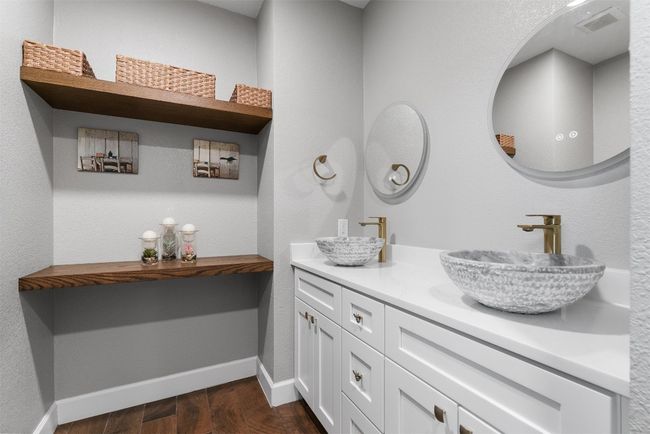 Each of the three remodeled bathrooms boasts a modern, spa-like design, turning everyday routines into a luxurious retreat | Image 16