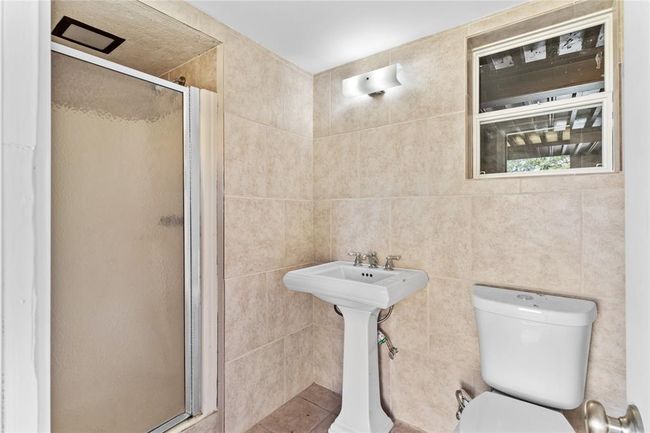 bathroom off the garage area | Image 20