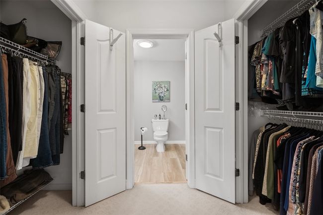 A chair rail and crown molding are other highlights to the master bedroom. | Image 23