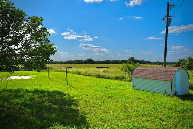 View of green lawn featuring a view of countryside | Image 18