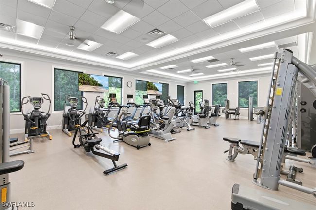 Gym featuring a drop ceiling and a raised ceiling | Image 38