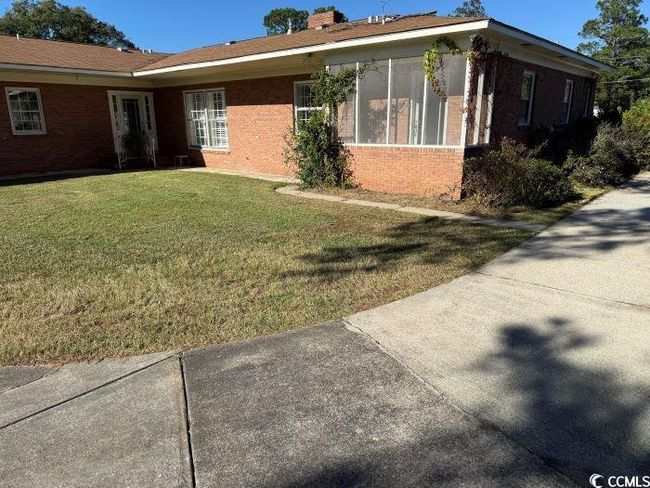 View of side of property featuring a yard | Image 38