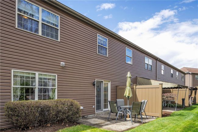 Rear Patio off the Kitchen with Privacy Fences on Both Sides. Very Private and Backs to Hillside. | Image 16