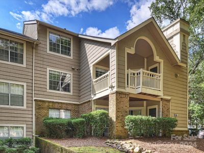 Two Story Condo Exterior with an Awesome Covered Porch | Image 1