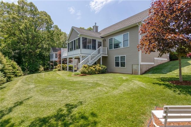 There is plenty of greenery to enjoy in this community. Another exterior feature are gutter screens. | Image 19