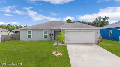 516 Fitchburg Street Sw, House other with 4 bedrooms, 2 bathrooms and null parking in Palm Bay FL | Image 1