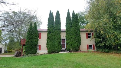 View of front of home with a front yard | Image 1