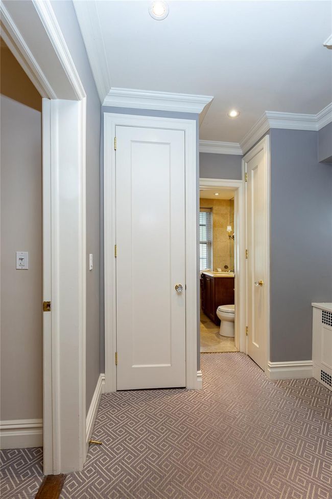 Corridor featuring carpet flooring, ornamental molding, and recessed lighting | Image 13