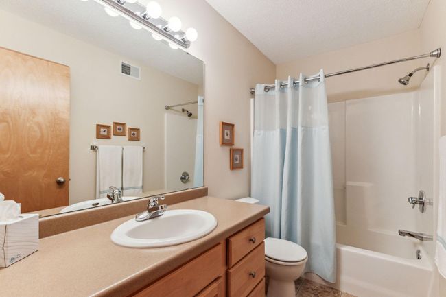 The main upper bath has a 36" high vanity. Combination tub and shower. | Image 21