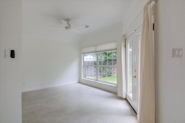 Formal dining area? Study? Playroom? You choose! | Image 12