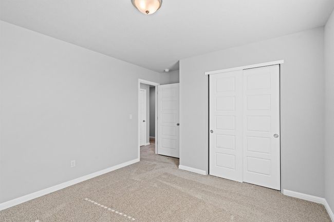 Unfurnished bedroom featuring carpet floors and a closet | Image 30