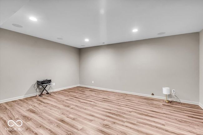 Large area in the basement complete with built-in surround sound system, perfect for your next movie night. | Image 30