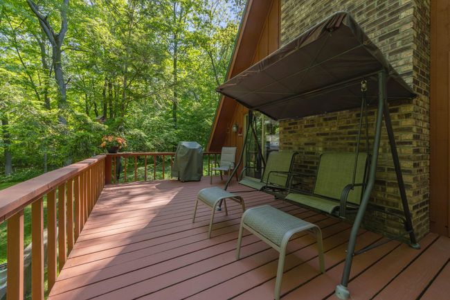 Section 1 of back deck over looking the river #1. | Image 25