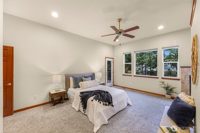 Primary bedroom with access to the deck | Image 16