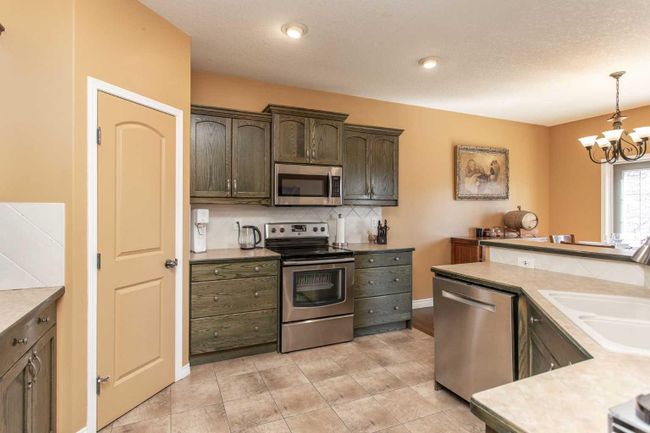 65 Ogilvie Close, Home with 4 bedrooms, 3 bathrooms and 2 parking in Red Deer AB | Image 8