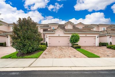 1435 El Conte Drive, Townhouse with 3 bedrooms, 2 bathrooms and null parking in CHAMPIONS GATE FL | Image 1