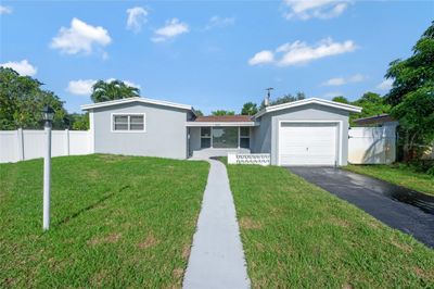 3303 Nw 37 Th Av, House other with 3 bedrooms, 2 bathrooms and null parking in Lauderdale Lakes FL | Image 2