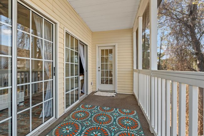 View of unfurnished sunroom | Image 22