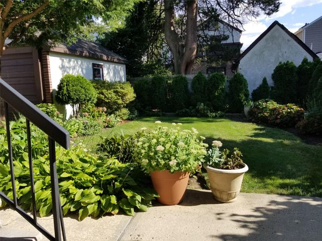 View of yard with an outdoor structure | Image 15