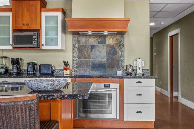 402 - 191 Kananaskis Way, Condo with 3 bedrooms, 3 bathrooms and 1 parking in Canmore AB | Image 18
