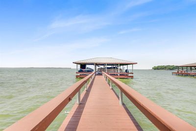 Every lake house needs views like this...plus an amazing boathouse to make getting out on the lake a breeze! | Image 2