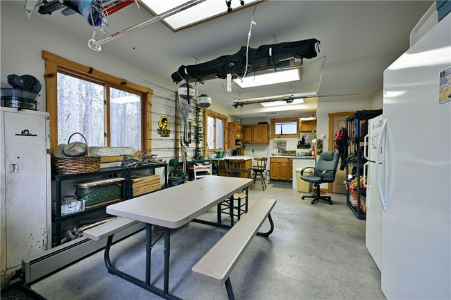 Heated and insulated room with kitchen and endless possibilities. | Image 38