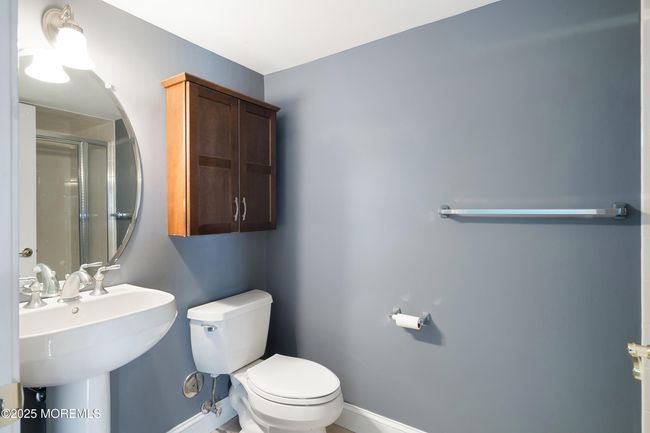 Bathroom first level w/walk in shower | Image 8