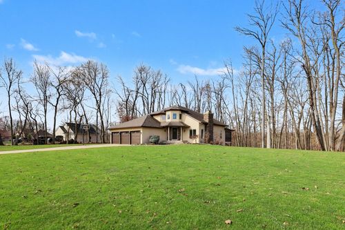 2011 Knollpoint Dr Ne, Ada, MI, 49301-9249 | Card Image