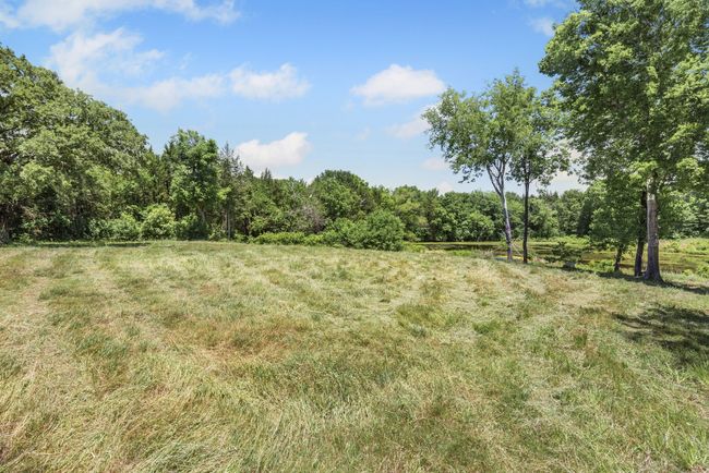 Beautiful open area overlooking the large pond! | Image 18