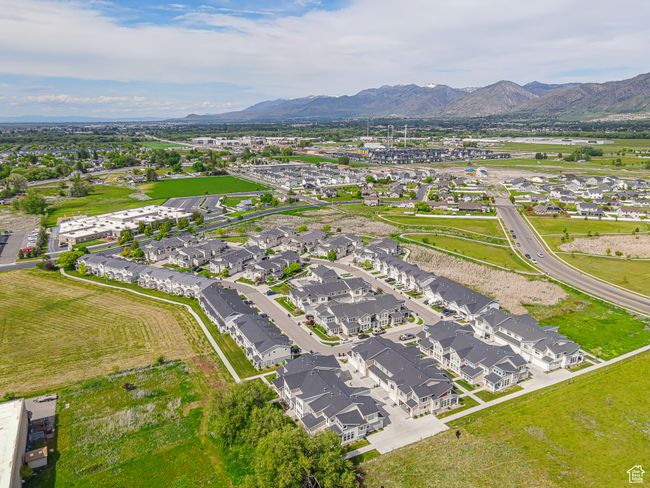 Aerial view of residential area featuring a mountain backdrop | Image 31