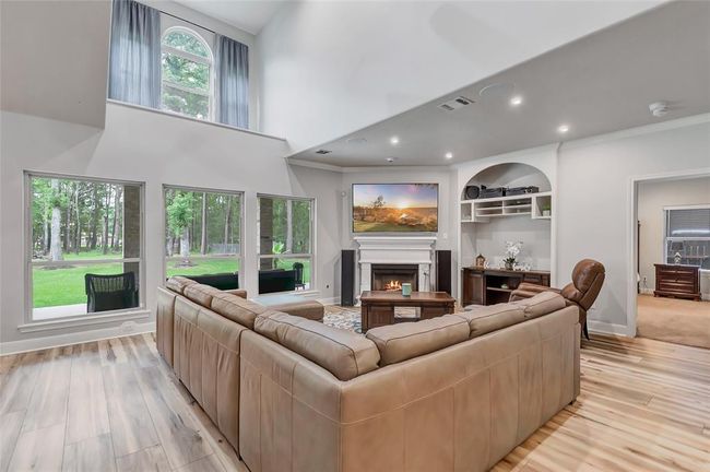 Living Room open to the breakfast area and upstairs with high ceilings and surround sound | Image 12