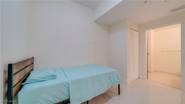 Tiled Den featuring a half bathroom | Image 6