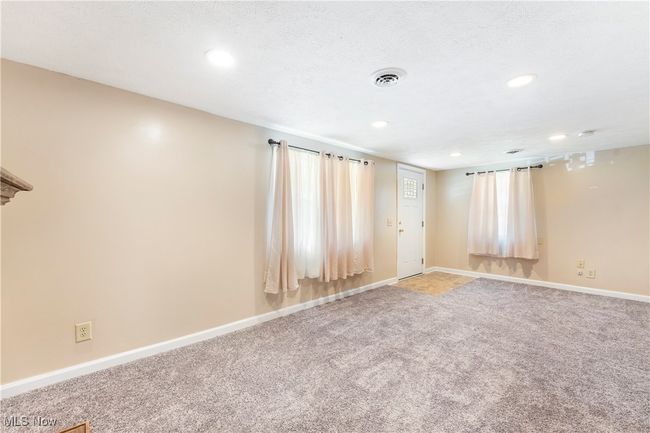 Empty room featuring recessed lighting, visible vents, light colored carpet, and baseboards | Image 33