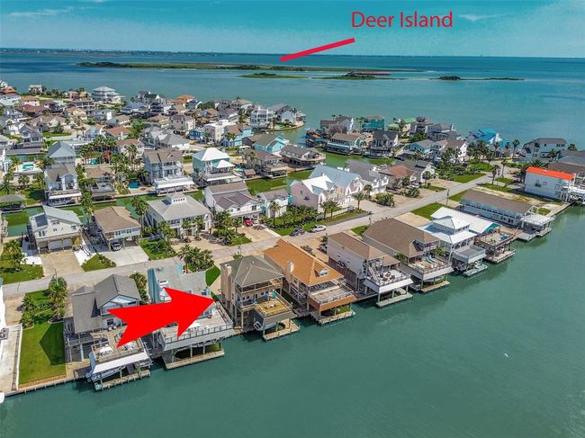 This home is perfectly situated right on the water, offering direct views across the bay and near Deer Island with convenient access to the Causeway. | Image 40