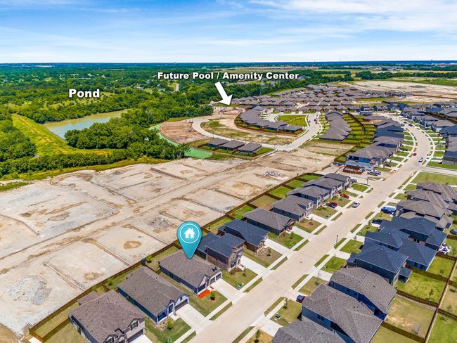 Aerial perspective of suburban area with a nearby body of water | Image 36