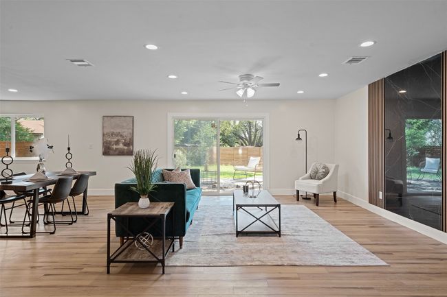 Living area featuring recessed lighting, ceiling fan, light wood-style floors, and baseboards | Image 13
