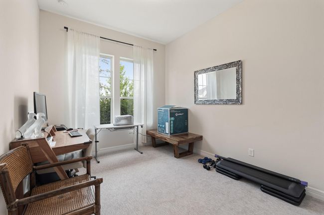 Lots of natural light and luxury carpet in one of the secondary bedrooms. | Image 26